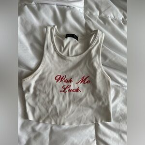 White “wish me luck” tank top